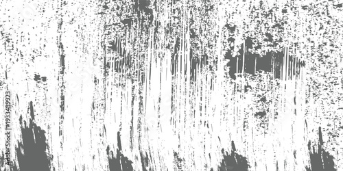 Grayscale abstract texture featuring dense vertical white brush strokes against a dark gray backdrop. The white paint shows varying densities and textures creating a distressed grunge effect.