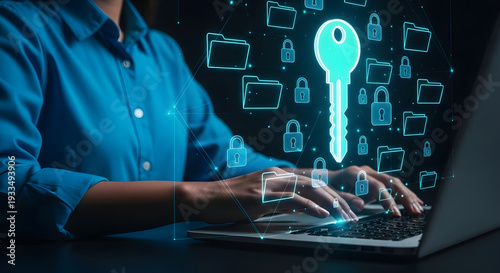 Person typing on laptop with digital security icons and large key technology data