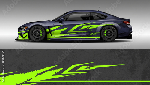 Dark blue sports car with aggressive neon green graphic wrap design on its side, showcasing a modern racing livery.