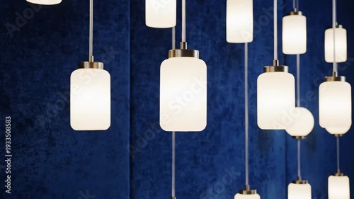 Elegant Lighting Fixtures Hanging Against a Blue Wall.