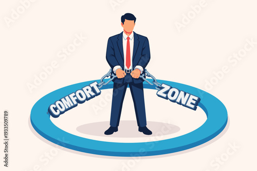 Businessman in suit standing inside a blue comfort zone circle with hands in handcuffs chained to the words, representing psychological barriers, fear of change, and professional stagnation.