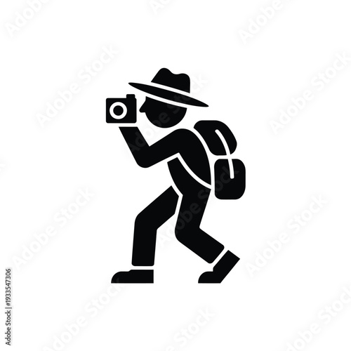 Silhouette of a paparazzi photographer secretly taking pictures