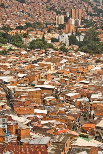 Vibrant street art in Comuna 13, Medellin. Iconic electric escalators, colorful graffiti, and urban transformation. Ideal for travel, culture, and South American tourism photography.