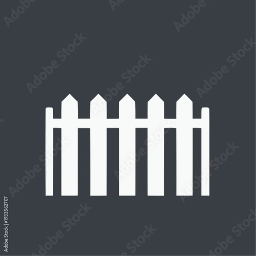 White picket fence on a dark background with copy space