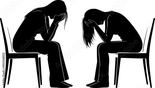 Two women silhouettes sitting on chairs with heads in hands in despair woman female
