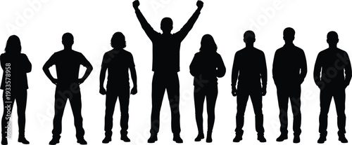 Silhouette of diverse group of people standing together with one successful leader raising arms in celebration of achievement and teamwork