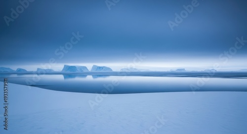 Minimalist landscape of icy waters and distant ice formations against a cloudy sky
