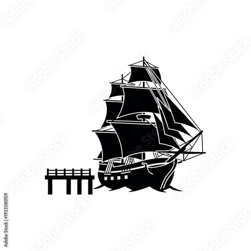 Sailing ship docked at a pier.