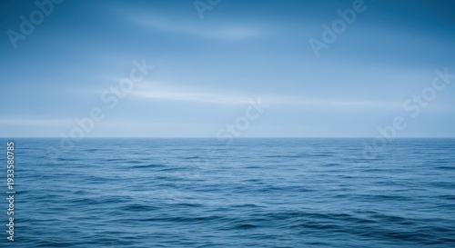 Calm ocean horizon under a cloudy sky with copy space serene and tranquil scene