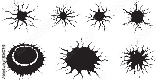 A set of eight distinct black silhouettes featuring various ground cracks, deep impact holes, and surface destruction patterns on a white background.