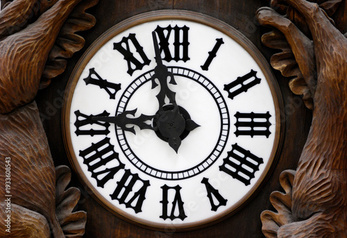 Old Wooden Clock Dial with hands at nine o'clock