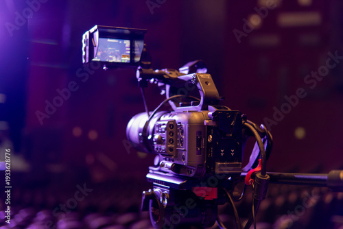 Professional video camera recording live concert broadcast