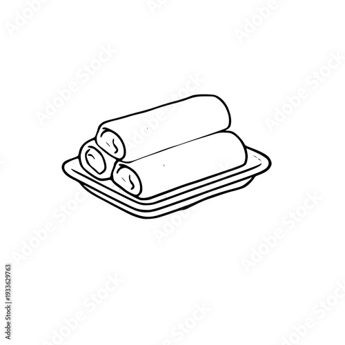 Delicious spring rolls on a plate, perfect for Asian cuisine