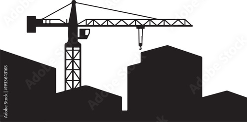 Black silhouette construction crane and buildings