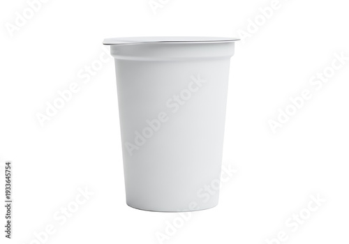 A white cylindrical yogurt container sealed with a metal foil lid stands on a white surface The container casts a shadow