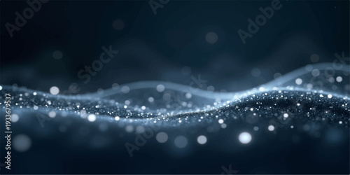 A fluid motion of water drops on a blue glass background creates a glowing texture of bubbles and light waves for a winter night wallpaper design