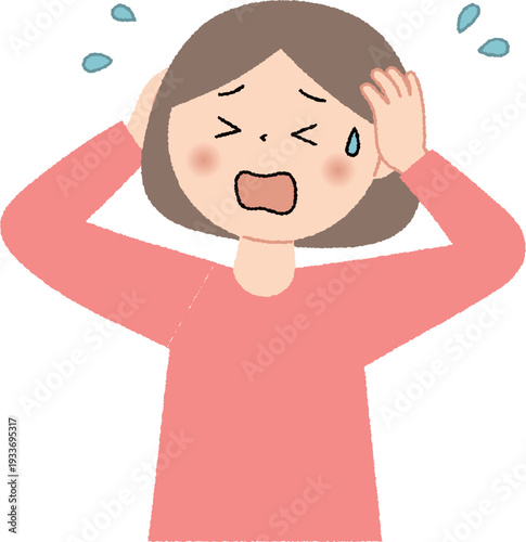 頭を抱えて困っている若い女性