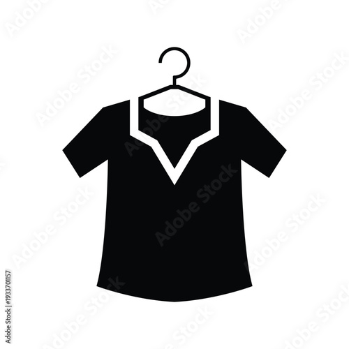 A simple black silhouette icon depicting a stylish shirt or blouse hanging neatly on a clothes hanger, symbolizing fashion, apparel, and laundry.
