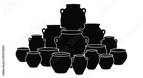 Collection of diverse black ceramic pots arranged in a pleasing composition