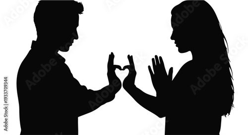 Silhouettes of a couple forming a heart shape with their hands, symbolizing love and connection.
