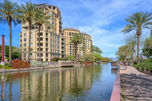 Modern buildings a canal and recreational area Scttsdale AZ.