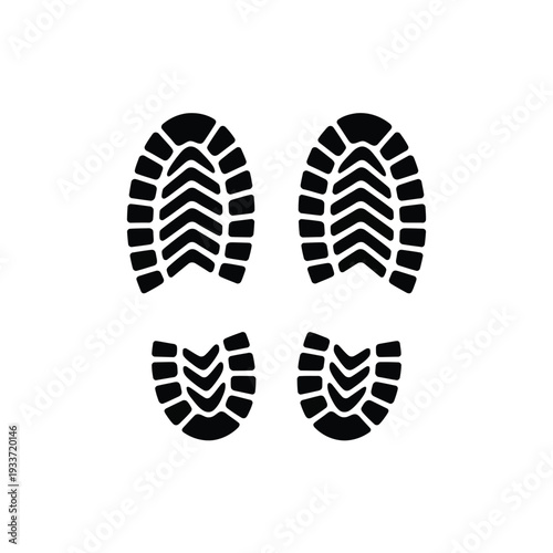 Black footprints a pair of shoe prints and partial heel impressions