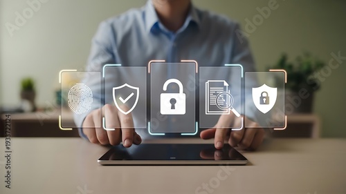Person interacting with a tablet displaying digital security including fingerprint and unlocked padlock