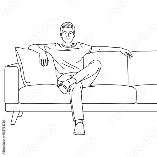 Man Relaxing on Couch with Legs Crossed.