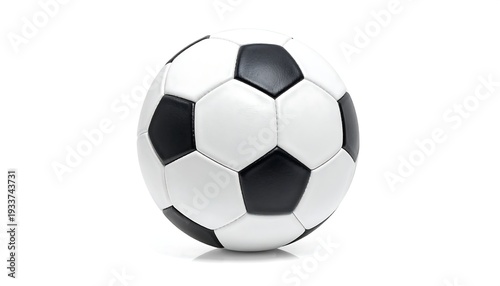 Black and white soccer ball with hexagonal and pentagonal patches casts subtle shadow on a clean, white surface