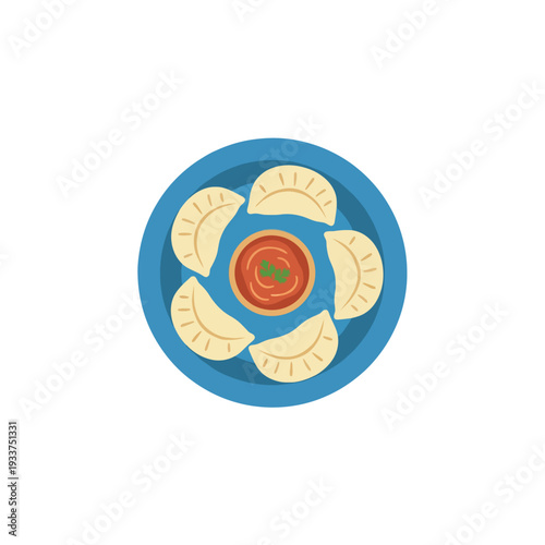 Asian Dumplings with Dipping Sauce on Blue Plate