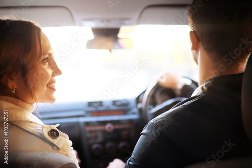 A man and a girl in love on a first date in an autumn city park.