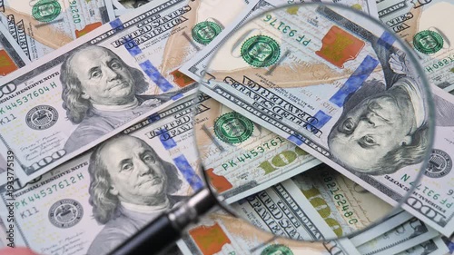 Wallpaper Mural US hundred dollar bills, arranged randomly, slowly rotating. View from above. Torontodigital.ca