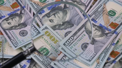 Wallpaper Mural The hands of an elderly accountant sort through US $100 bills and examine them with a magnifying glass. Torontodigital.ca