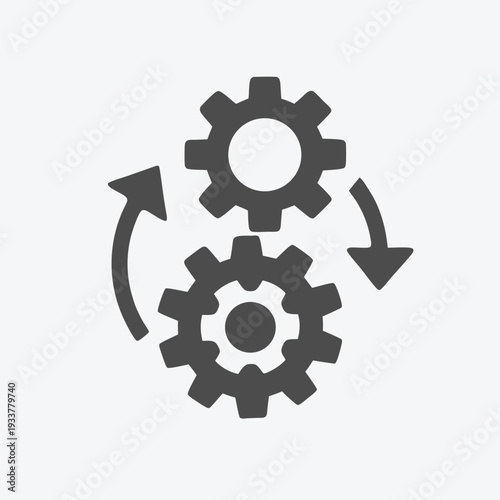 Two gears are turning with arrows forming a system in motion on the isolated background