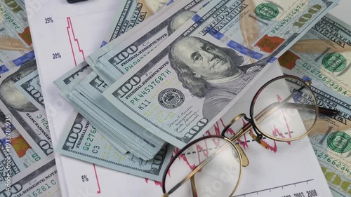 Wallpaper Mural US hundred dollar bills, arranged randomly, slowly rotating. View from above. Torontodigital.ca