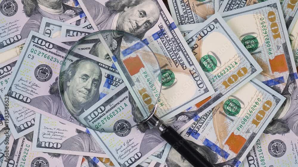 custom made wallpaper toronto digitalThe hands of an elderly accountant sort through US $100 bills and examine them with a magnifying glass.