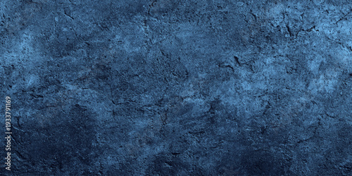 Dark blue slate wall texture background moody charcoal grey concrete surface natural variations, weathered grain.