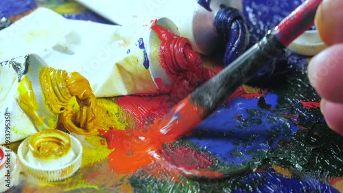 Wallpaper Mural The hands of the artist, work to create creative images in art. Art paints and brushes, applying multi-coloured strokes to the canvas using palette, gouache and watercolour. Torontodigital.ca