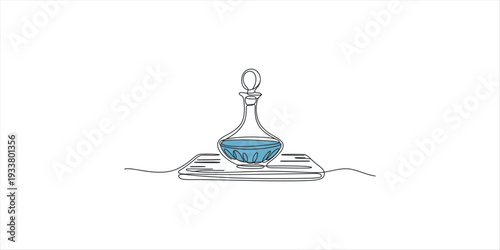 Minimalist sketch of a glass decanter with blue liquid sitting on top of an old book