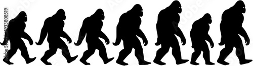 Black silhouette illustration of seven Bigfoot or Sasquatch figures walking in a line, representing a humorous "evolution of Bigfoot" concept on white background.