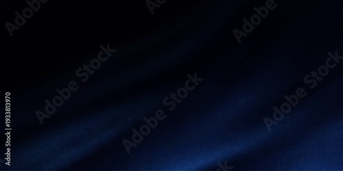 Dark blue abstract background:A captivating dance of deep blues, merging into a mysterious display of texture.  It's a versatile backdrop.