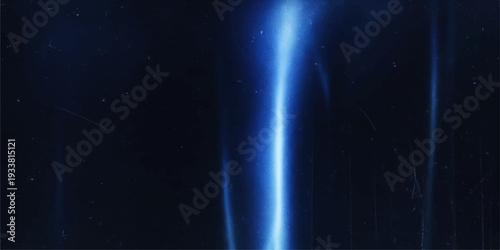 Abstract Blue Light Effect: A striking display of blue light beams, a captivating visual that conveys a sense of energy, mystery and dynamic movement.