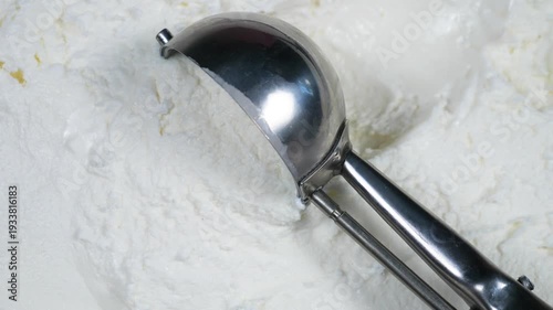 Wallpaper Mural Vanilla ice cream in a metal container, scooped out with a packing spoon. Torontodigital.ca