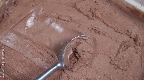 Wallpaper Mural Chocolate ice cream in a metal container, scooped out with a packing spoon. Torontodigital.ca