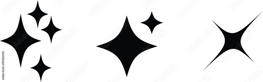 Obraz premium A collection of five black glimmering shapes resembling stars on a bright white surface