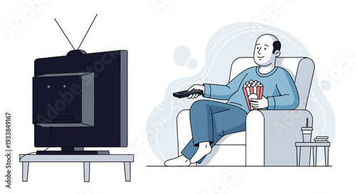Relaxed man sitting in a comfortable armchair watching television while enjoying a bowl of popcorn and a refreshing drink at home.