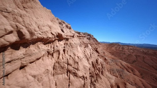Drone FPV Shot of Dramatic Red Canyon Landscape