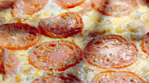 Close-up of a pizza cooking in the oven, making pizza to order using a homemade recipe and delivering to the customer, supporting local businesses and pizzerias