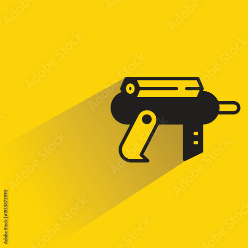space gun blaster icon with shadow yellow background