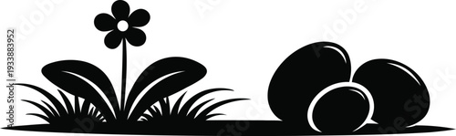 Black silhouette of a flower and rocks on a white background